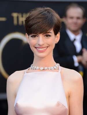 Anne Hathaway cortou os cabelos para fazer Os Miseráveis, mas gostou tanto do look que resolveu adotar Foto: Getty Images