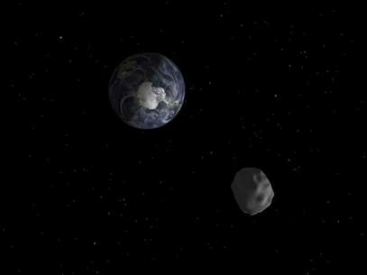 Nasa divulgou imagem de simulação da passagem do asteroide 2012 DA14. Agência vai monitorar o asteroide Foto: NASA / Reuters