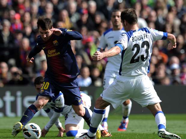 Liderado por Messi , Barcelona goleou o Getafe com grande facilidade no Camp Nou Foto: AFP