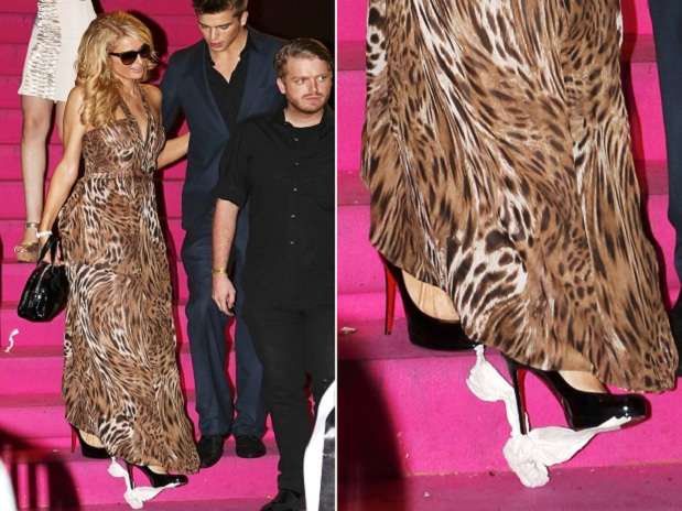 Paris Hilton circula com papel higi�nico preso ao sapato em Cannes
