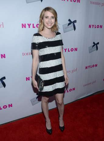 Listrado: listras são estampas clássicas e, por isso, bem-vindas em qualquer ocasião. Para a noite, o que muda são os materiais. Em vez de um vestido de algodão, uma versão mais sofisticada, com brilho, como a usada pela atriz Emma Roberts é ideal Foto: Getty Images