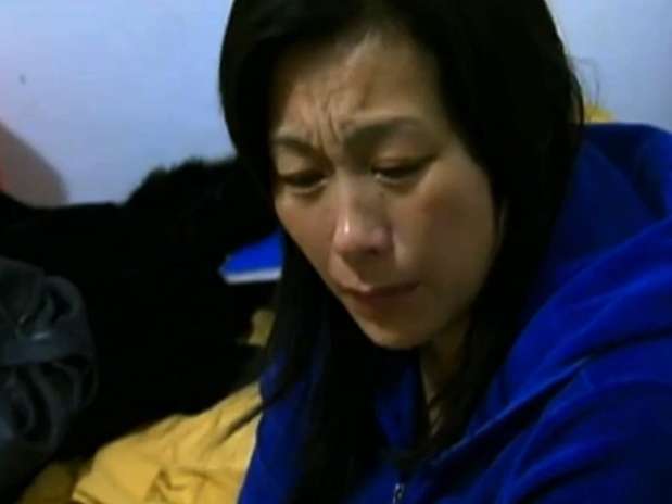 Xiaojie Li, de 44 anos, foi mobilizada por policiais e depois presa em uma loja da Apple nos EUA Foto: WCVB/Youtube.com / Reprodução