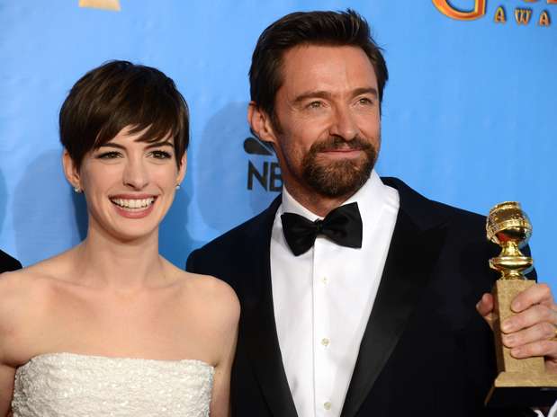 Anne Hathaway e Hugh Jackman foram premiados por suas atuações em 'Os Miseráveis' Foto: AP Anne Hathaway e Hugh Jackman foram premiados por suas atuações em 'Os Miseráveis' Foto: AP