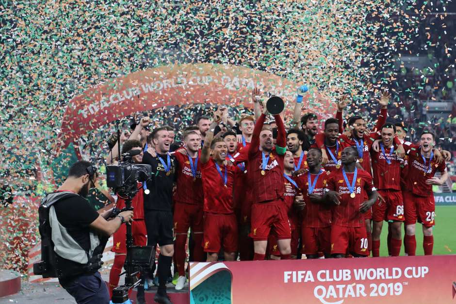 Time do Liverpool comemora título de campeão durante a partida entre Flamengo e Liverpool, válida pela final do Mundial de Clubes FIFA 2019, no Estádio Khalifa Internacional em Doha no Catar, neste sábado (21). Foto: Cristiano Andujar/Futura Press / Futura Press